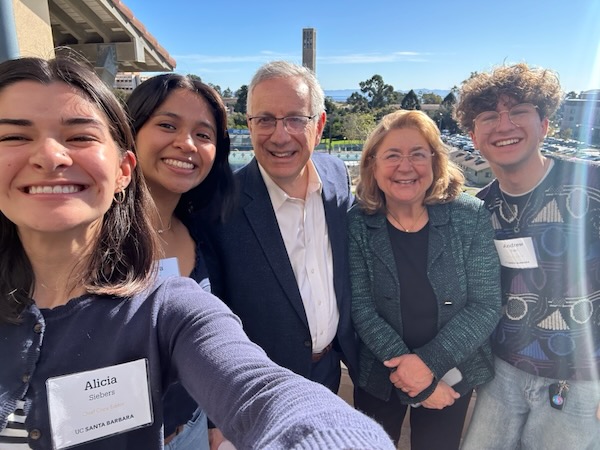 Andrew Tolu taking a selfie with UCSB leadership and Chancellor Yang at a campus student success event.
