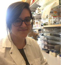 Headshot of Cristine Donham in a lab coat. 